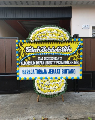 Papan Bunga Duka di Sariharjo